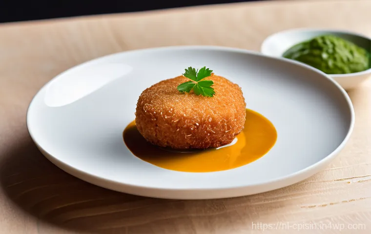 퓨전 요리 고전 요리와의 결합 - A meticulously plated 'Bitterbal' (Dutch croquette) with a rich, aromatic Massaman curry filling, se...